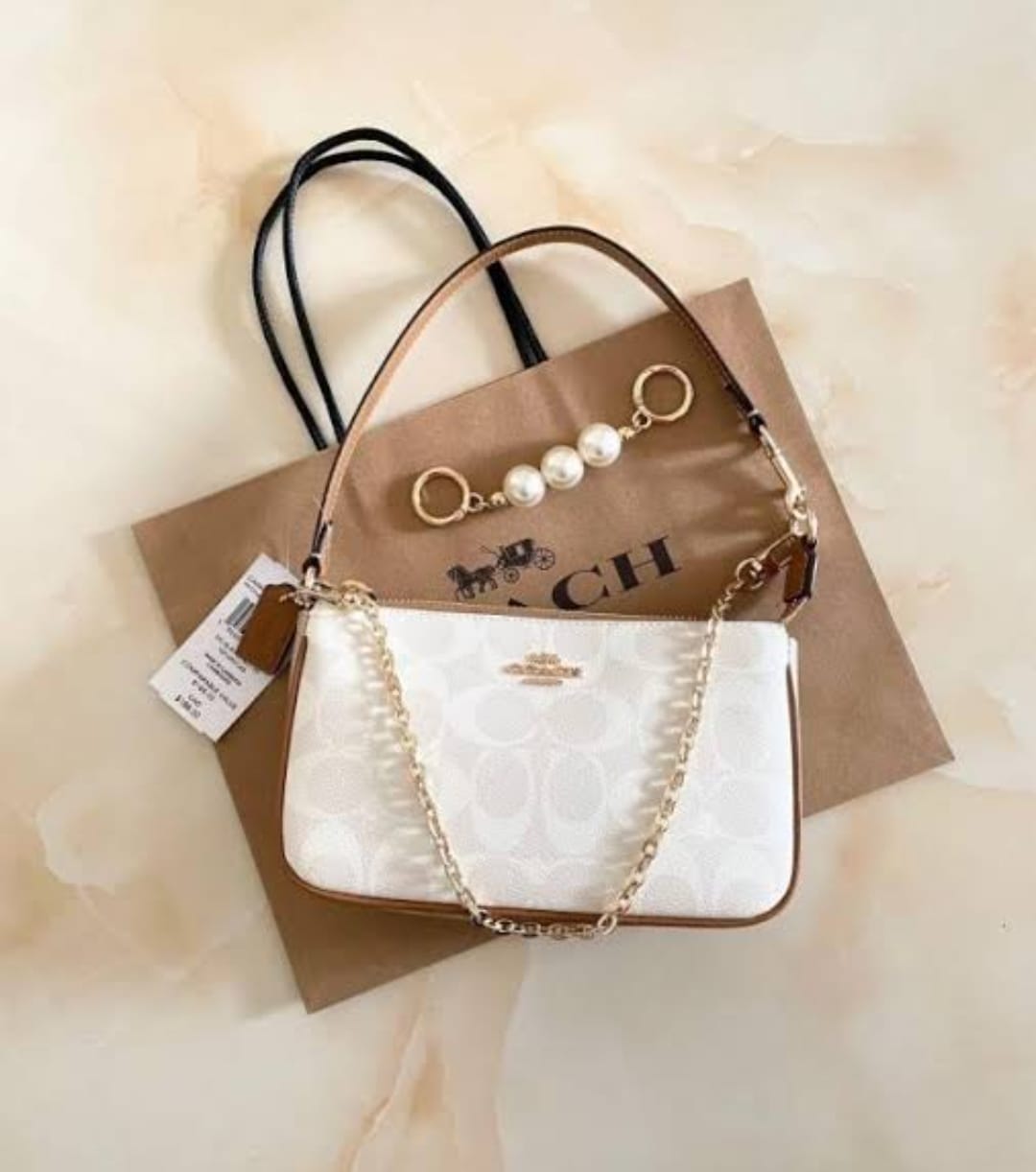 COACH SLING BAGS
