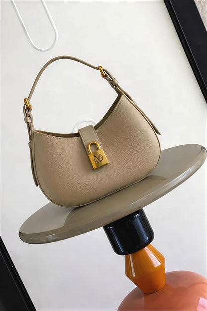 LOU-IS VU-IT-TON LOW KEY SHOULDER BAG
