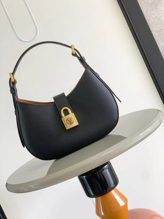 LOU-IS VU-IT-TON LOW KEY SHOULDER BAG